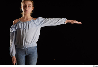 Sarah  1 arm blue blouse dressed flexing front view…